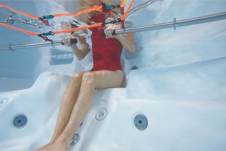 AquaFit swim spa female rowing